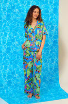 A lady wearing Arizona Long Knit Pj Set In Lobster Lounge