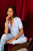 A lady wearing Dakota Knit Pj Set In Show Poodles