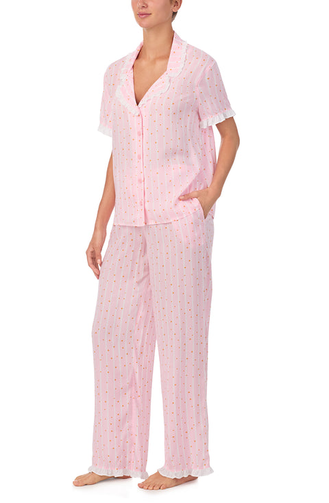 A lady wearing Chloe Pj Set In Starlit Stripes