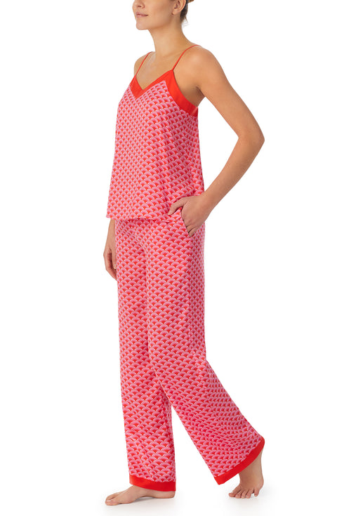 A lady wearing red sleeveless Lexi Pj Set with  Sunset Scallops print.