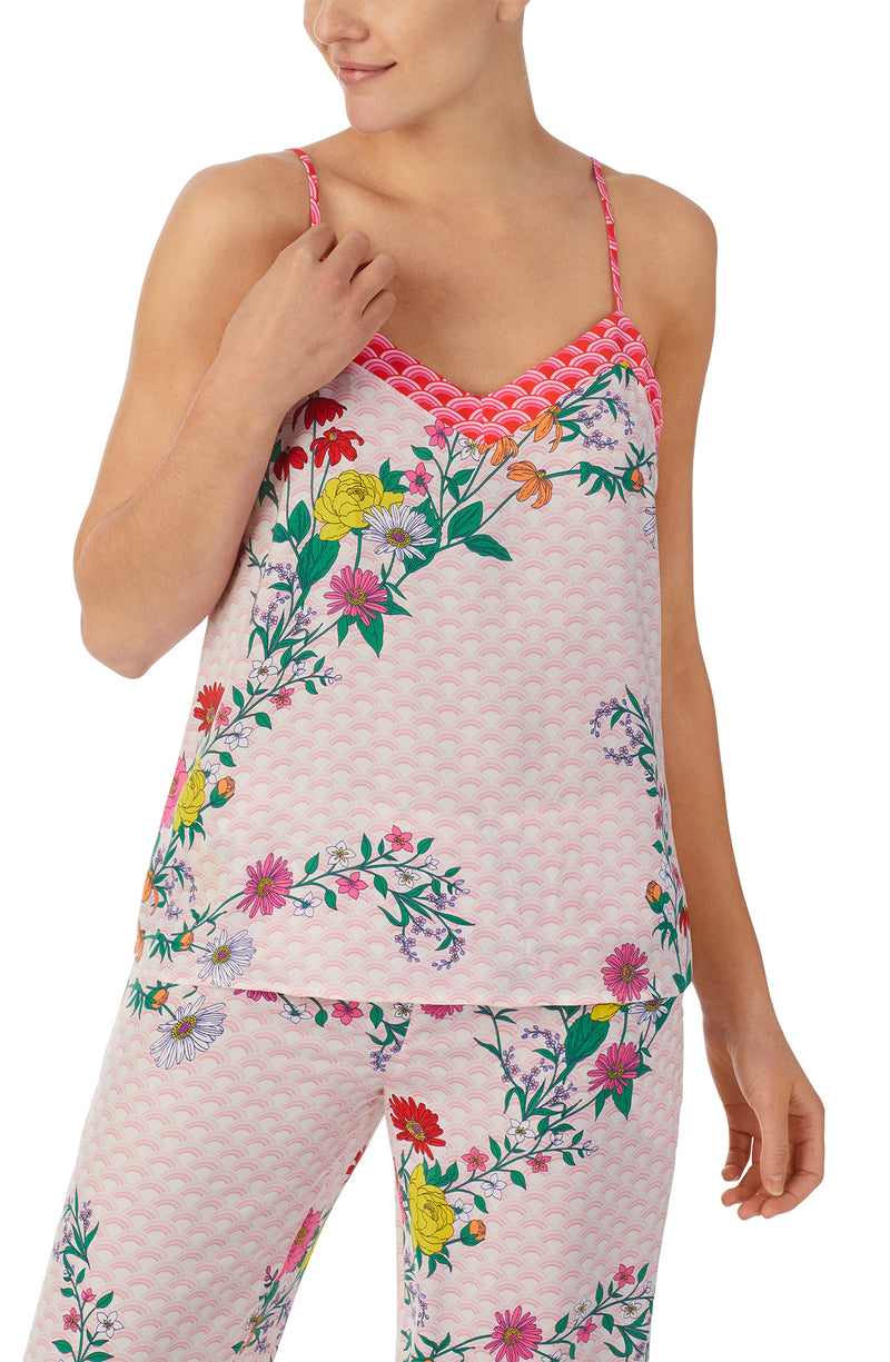 A lady wearing pink sleeveless Lexi Pj Set with Wildflowers print.
