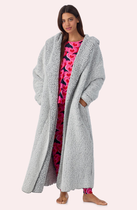 A lady wearing Aubrie Sherpa Long Jacket In Frosted Slate