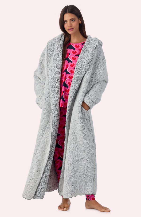 A lady wearing Aubrie Sherpa Long Jacket In Frosted Slate