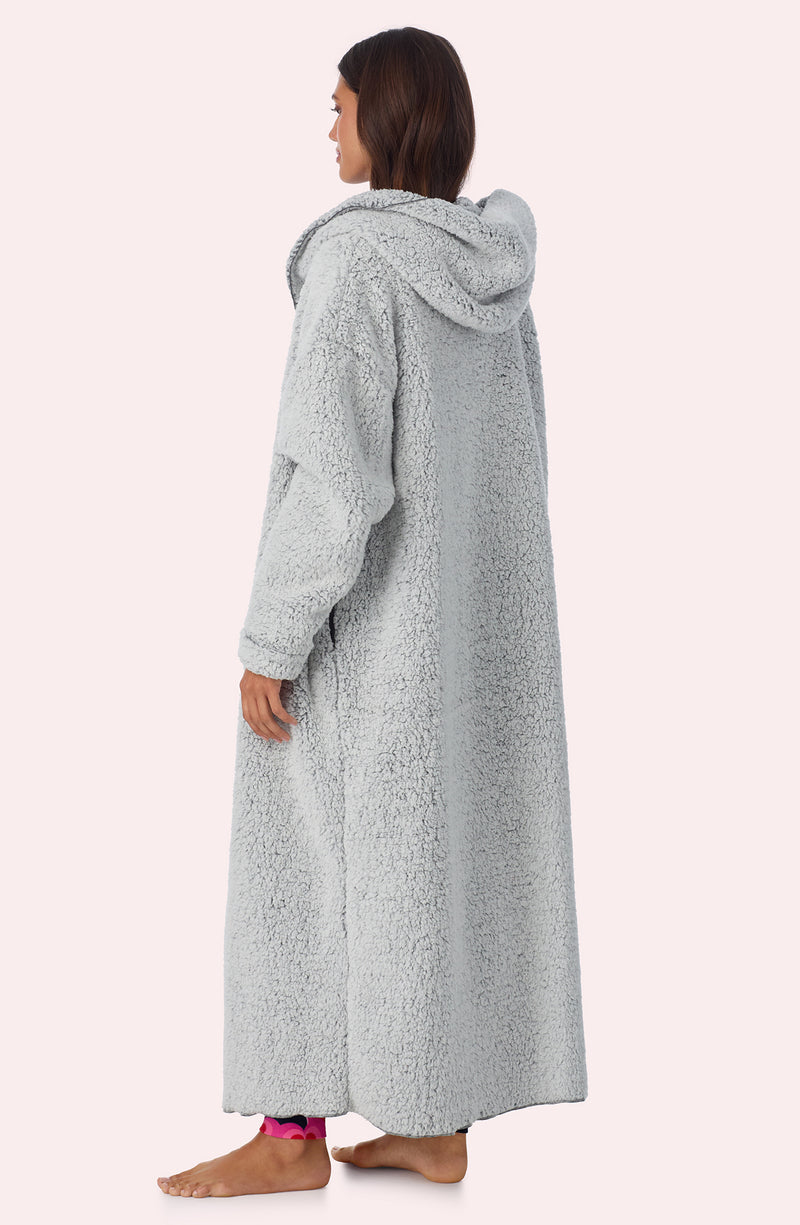 A lady wearing Aubrie Sherpa Long Jacket In Frosted Slate