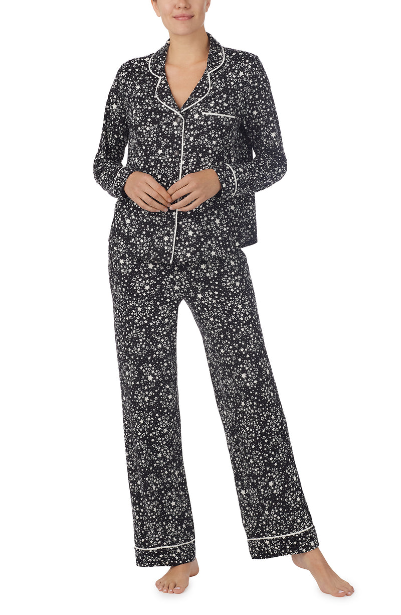 A lady wearing black Long Sleeve Charlotte Pj Set with Midnight Sky print.