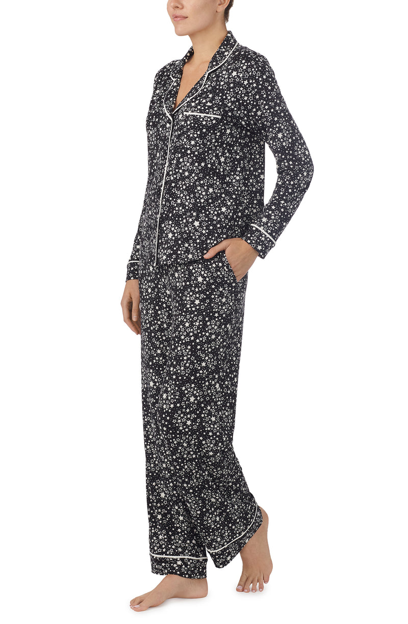 A lady wearing black Long Sleeve Charlotte Pj Set with Midnight Sky print.