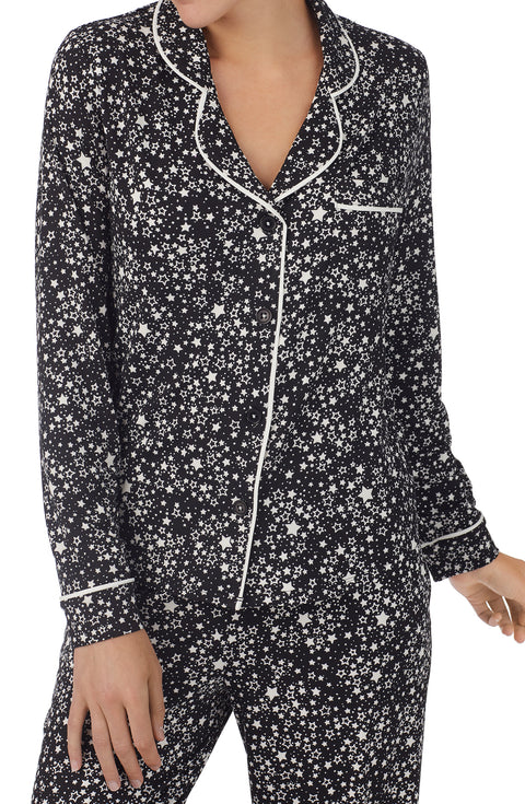 A lady wearing black Long Sleeve Charlotte Pj Set with Midnight Sky print.