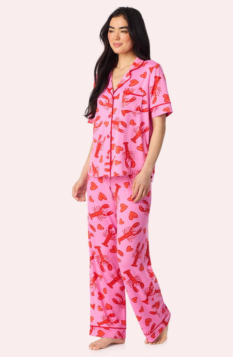 A Lady Wearing Sienna Long Knit Pj Set In Pinch Me Side Angle View