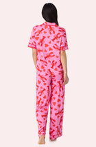 A Lady Wearing Sienna Long Knit Pj Set In Pinch Me Back View