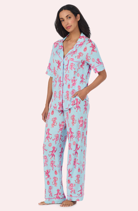 A Lady Wearing Dakota Long Knit Pj Set In Rodeo Ready in a side angled pose