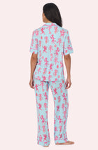 A Lady Wearing Dakota Long Knit Pj Set In Rodeo Ready in a back view pose