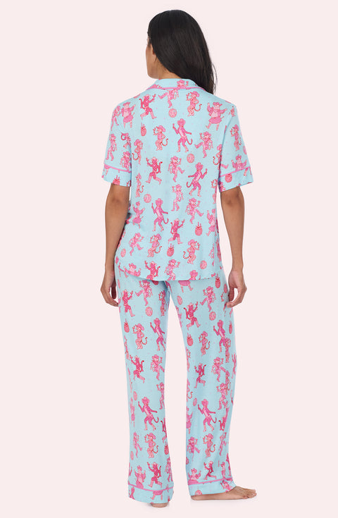 A Lady Wearing Dakota Long Knit Pj Set In Rodeo Ready in a back view pose