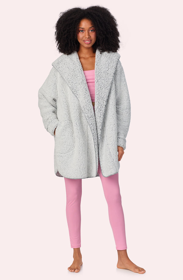 A lady wearing Aubrie Short Sherpa Jacket In First Frost print