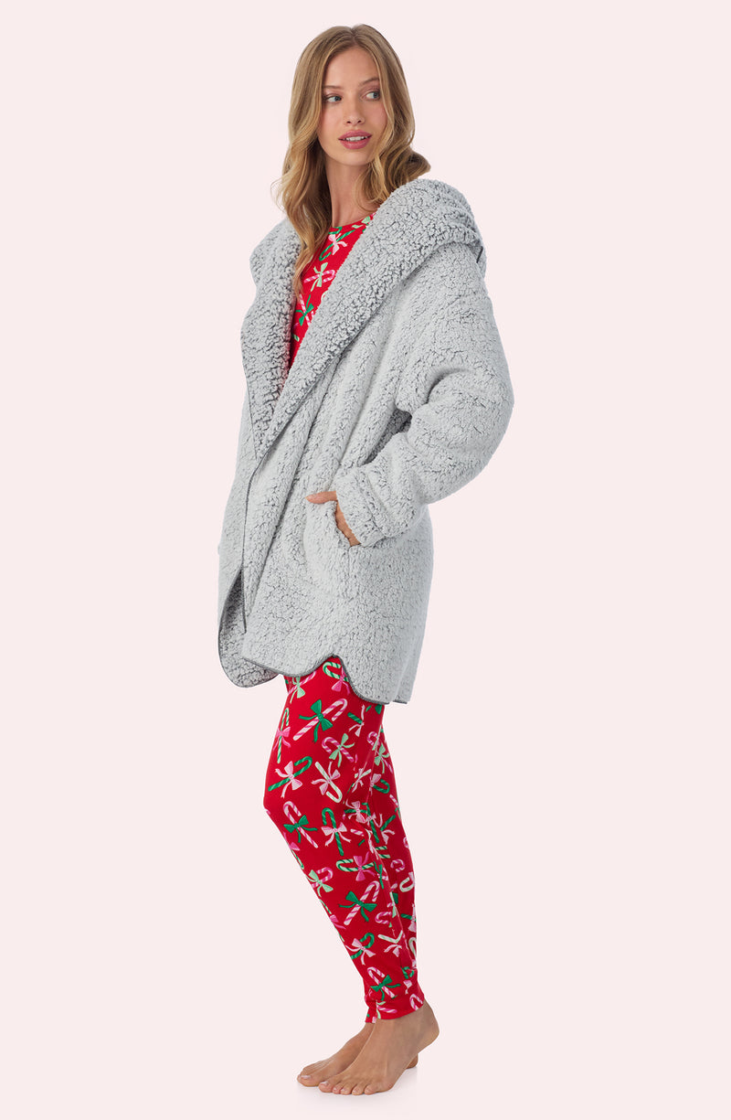 A lady wearing Aubrie Sherpa Short Jacket In Frosted Slate