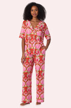A lady wearing Dakota Long Knit Pj Set In Cheeky Chimps