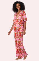 A lady wearing Dakota Long Knit Pj Set In Cheeky Chimps