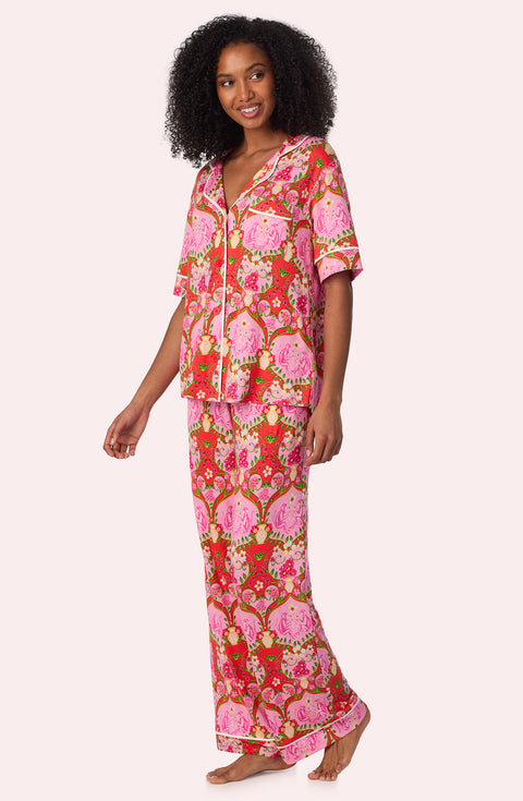 A lady wearing Dakota Long Knit Pj Set In Cheeky Chimps