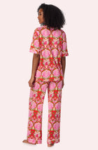 A lady wearing Dakota Long Knit Pj Set In Cheeky Chimps