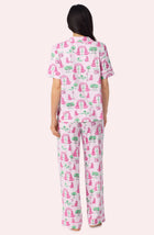A Lady Wearing Sienna Long Knit Pj Set In Palm Springs Poodle Back View