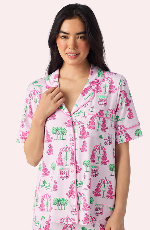 A Lady Wearing Sienna Long Knit Pj Set In Palm Springs Poodle Closeup View