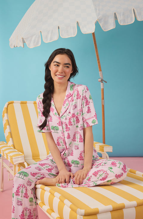 A Lady Wearing Sienna Long Knit Pj Set In Palm Springs Poodle