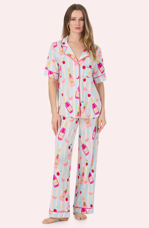A Lady Wearing Dakota Long Knit Pj Set In Bottle Service