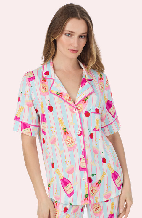 A Lady Wearing Dakota Long Knit Pj Set In Bottle Service in a front view close up shot
