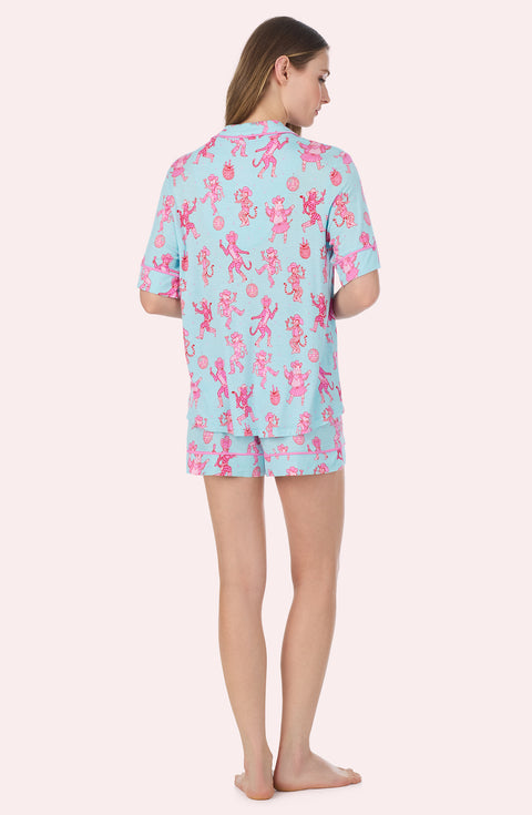 A Lady Wearing Dakota Short Knit Pj Set In Rodeo Ready in a back view pose