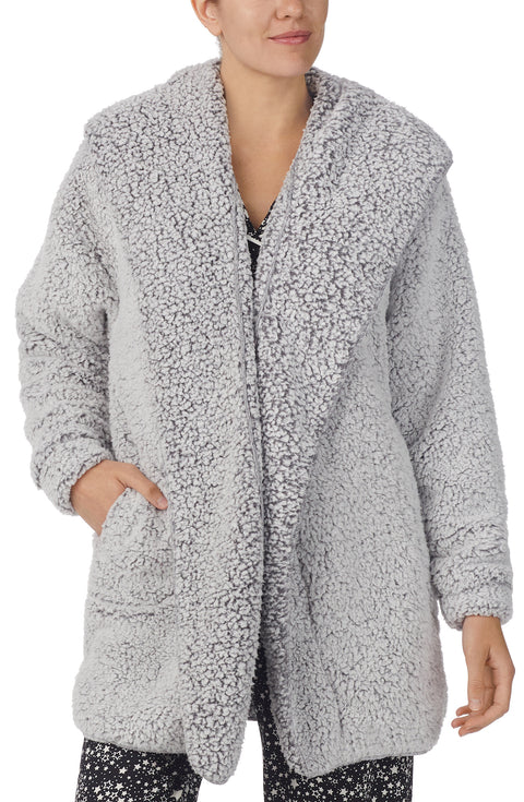 A lady wearing Grey Long Sleeve Aubrie Short Jacket with Frosted Slate print.