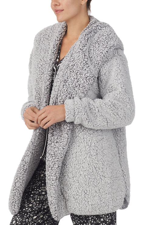 A lady wearing Grey Long Sleeve Aubrie Short Jacket with Frosted Slate print.