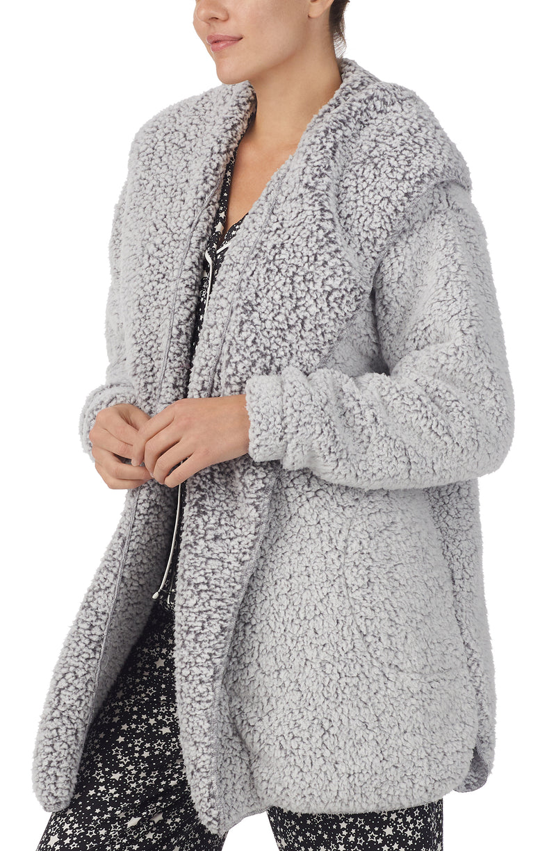 A lady wearing Grey Long Sleeve Aubrie Short Jacket with Frosted Slate print.