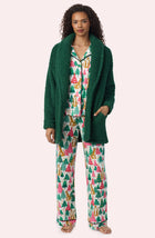 A Lady Wearing Blake Sherpa Short Jacket In Pine Green