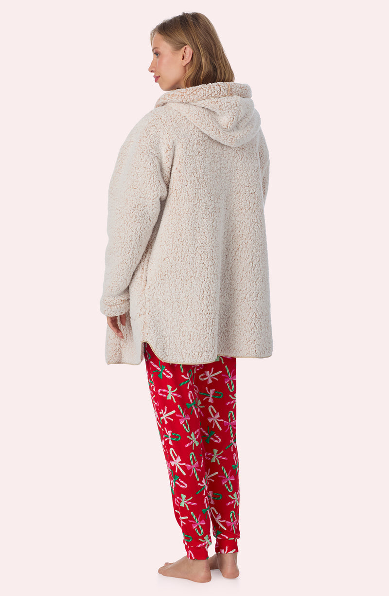 A lady wearing Aubrie Sherpa Short Jacket In Frosted Cappuccino