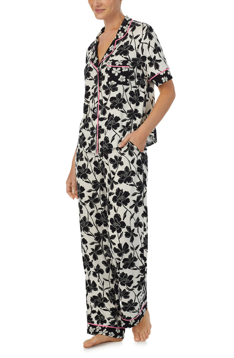 A lady wearing Dakota Pj Set In Shadow Floral