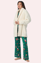 A Lady Wearing Blake Sherpa Short Jacket In Cream in a side angle pose