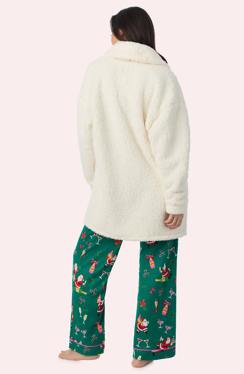A Lady Wearing Blake Sherpa Short Jacket In Cream in a back view pose