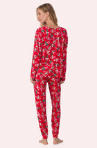 A lady wearing Lorena Long Knit Pj Set In Candy Cane Cutie