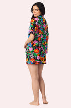 A Lady Wearing Sienna Short Knit PJ Set in Wild Garden Side Angle Back View