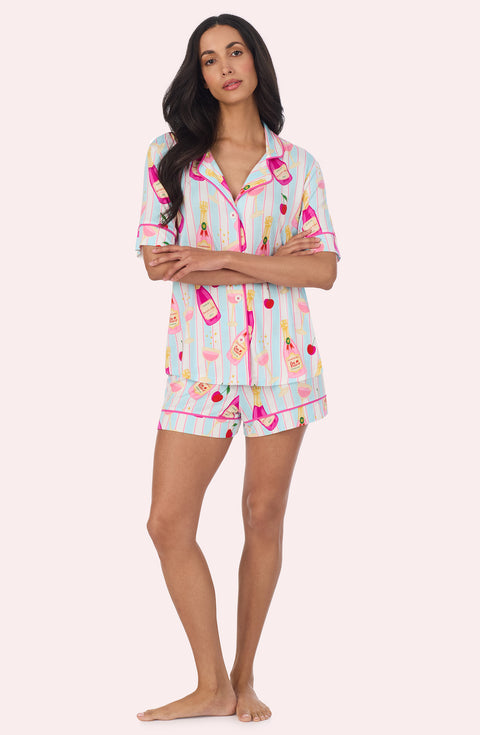 A Lady Wearing Dakota Short Knit Pj Set In Bottle Service