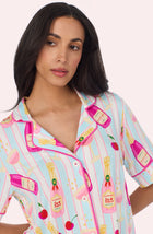 A Lady Wearing Dakota Short Knit Pj Set In Bottle Service in a close up front view shot