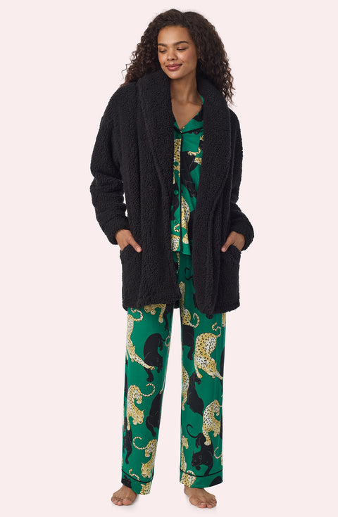 A Lady Wearing Blake Sherpa Short Jacket In Black
