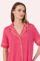 A Lady Wearing Dakota Short Knit Pj Set In Berry Stripe in a front view close up pose
