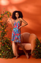 A lady wearing Ella Knit Chemise In Sapphire Safari