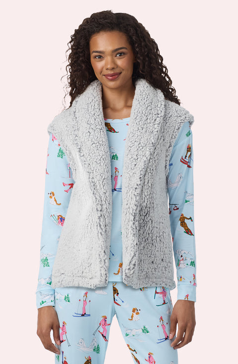 A Lady Wearing Tessa Sherpa Vest In Frosted Slate