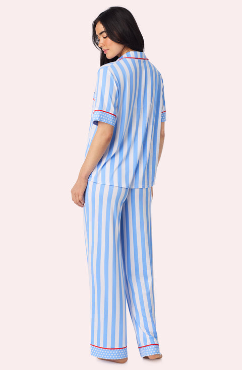 A Lady Wearing Sienna Long Knit Pj Set In True Blue Stripe Back View