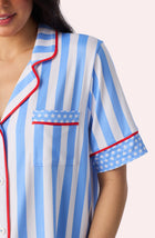 A Lady Wearing Sienna Long Knit Pj Set In True Blue Stripe Closeup Detail View