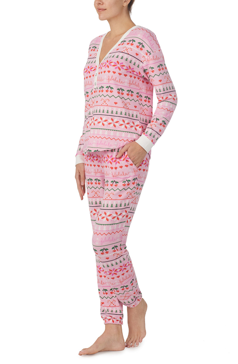 A lady wearing pink Long Sleeve Harper Long Pj Set with Festive Fling print.