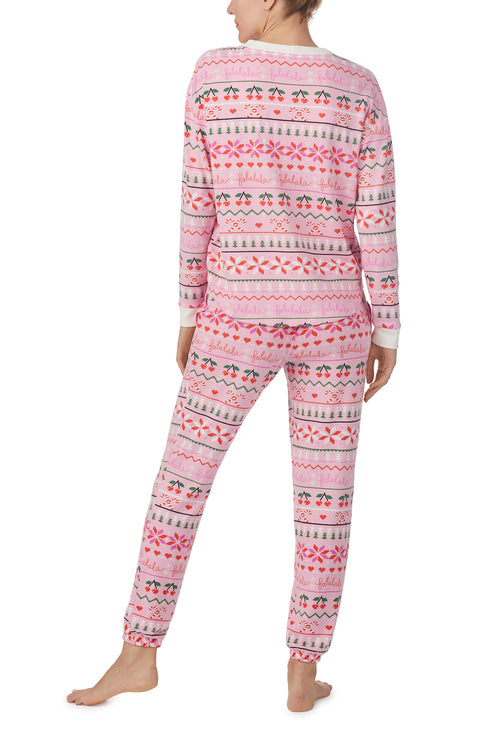 A lady wearing pink Long Sleeve Harper Long Pj Set with Festive Fling print.