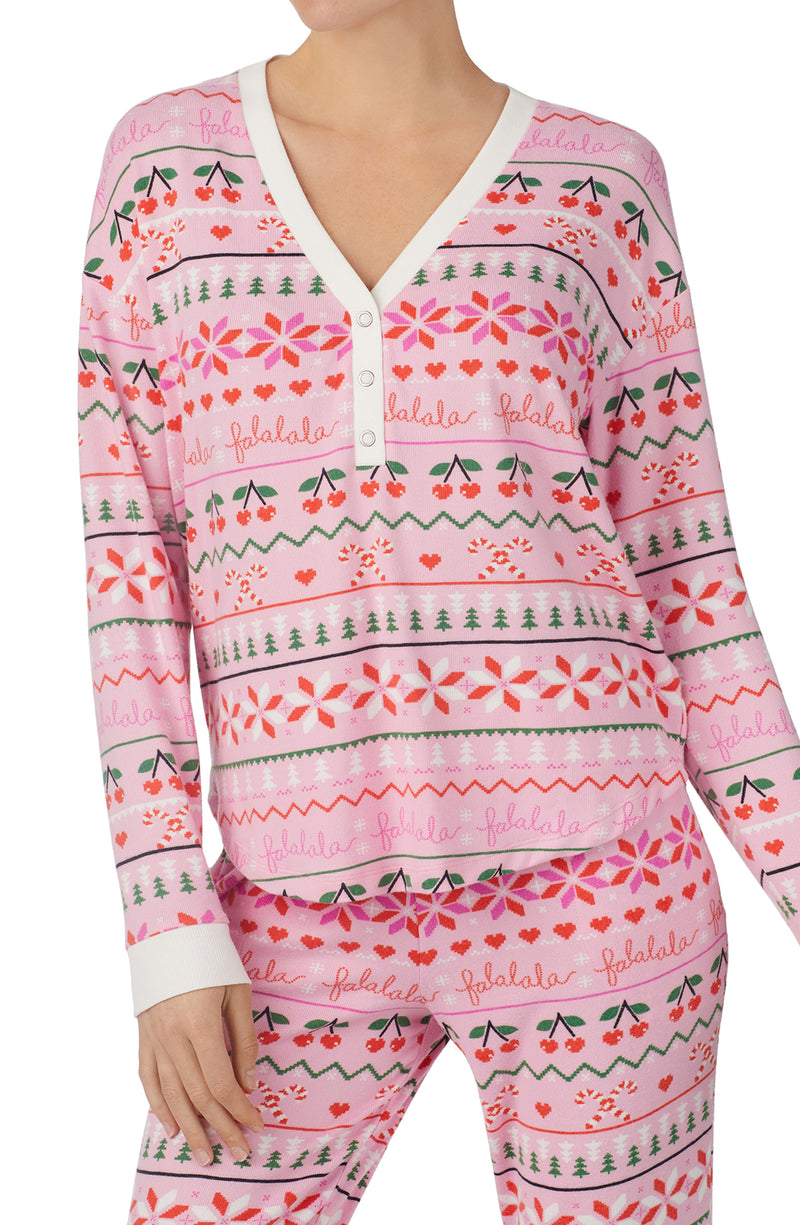 A lady wearing pink Long Sleeve Harper Long Pj Set with Festive Fling print.