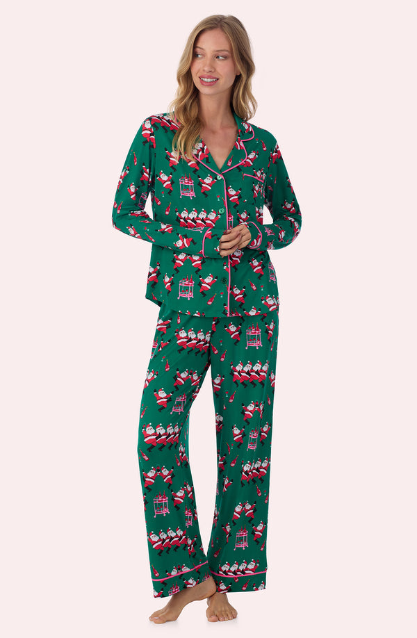 A lady wearing Charlotte Knit Pj Set In Jingle Bell Jive